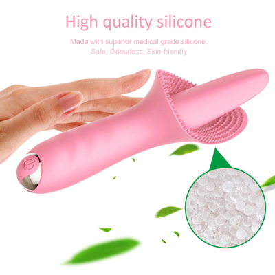 De Tong die van vrouwenclitorial Vibrator likken